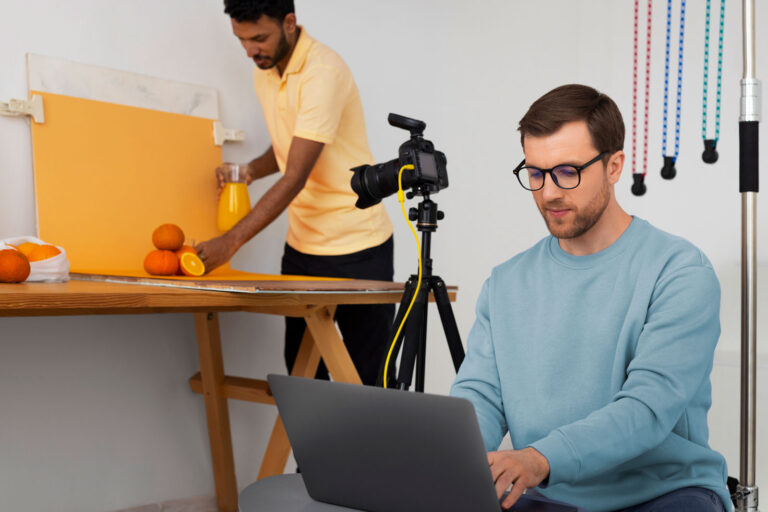 two videographers preparing to shoot video