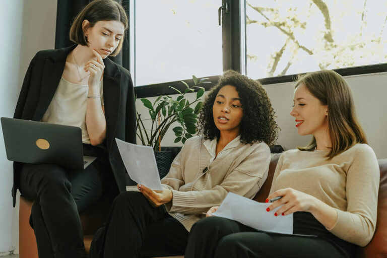 Empowering Small Businesses with three women on computer
